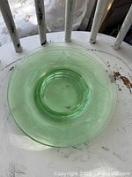 Top view of one green uranium glass plate showing color and pattern