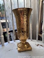 Full view of vase front showing shape and finish