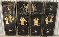 Four black lacquer panels with gold/ivory chinoiserie figures and landscapes