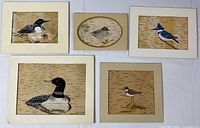 Group shot showing all five matted birch-bark bird paintings