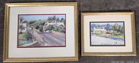 Both framed landscape prints side by side showing relative sizes and frames