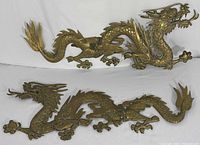 Front view showing both brass dragon plaques