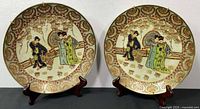 Front view of both plates on stands