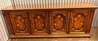 Front view of buffet sideboard showing four marquetry doors