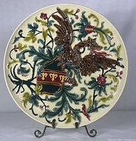 Front view of the majolica charger showing full relief decoration