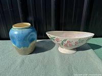 Both vases side by side for scale and style comparison