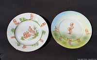 Both Kewpie decorated plates front view