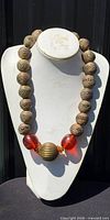 Full view of necklace on display bust