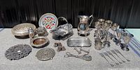 Full lot overview showing all silverplated pieces