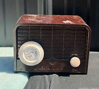Front view showing tuning dial, power knob, grille and Blonder Tongue branding