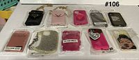 Top-down view of all ten packaged cases laid out in two rows