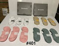 Assorted socks laid out by colour with Breslatte boxes
