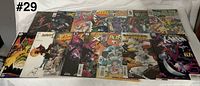 All fifteen comic books laid out together