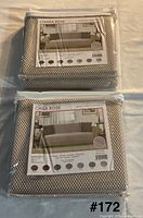 Two sealed packages of Chiara Rose sofa furniture protectors showing front labels and color swatches
