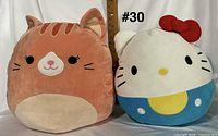 Front view of both plush toys