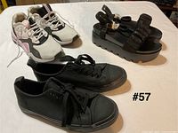 All three pairs of shoes group view