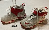 Both sneakers side view showing uppers, soles, style and colorway