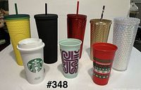 Front view of all nine cups showing colours and styles