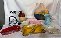 Group shot of all nine items in lot