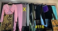 Group shot of nine hanging garments