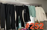All five garments hanging