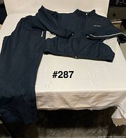 Track suit laid out showing jacket and pants