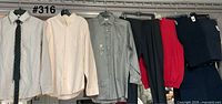 All garments hanging on rack