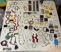 Overview of entire jewelry lot on table