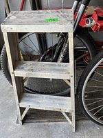 Front view of aluminum 2-step stool showing overall design