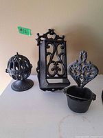 Overview of the three cast iron pieces
