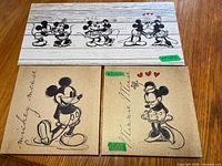 All three canvas pieces displayed: one rectangular, two square