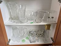 Overall view of both shelves displaying full lot