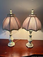 Both matching table lamps powered off on table