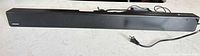 Full view of Samsung soundbar with attached power cable