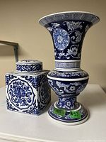 Ginger jar and pedestal vase side by side showing overall design and scale
