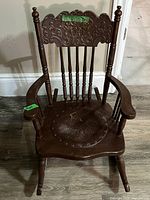 Front view of entire rocking chair showing design and overall condition