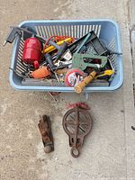 Group shot of basket of assorted tools plus separate bench plane and pulley block