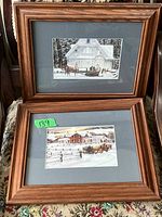 Both framed prints stacked together showing frames, mats, subjects