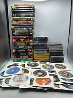 Overall view of boxed games, jewel cases and loose discs