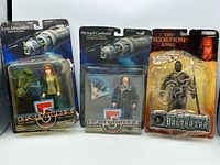 Front view showing all three carded figures and packaging condition