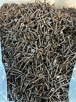Close view of screws showing type, finish and head style