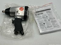 Impact wrench with manual visible