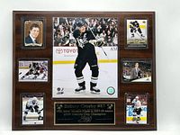 Front view of entire Sidney Crosby plaque showing photo, cards, and plate