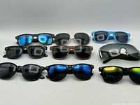 All nine pairs laid out in rows showing fronts and lens colours