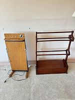 Towel rack and trouser press side by side for overall view and scale
