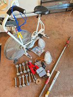 Overall lot including bike, dumbbells, plates, accessories