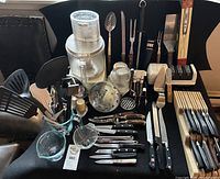 Overall lot showing food processor, knives, sharpeners, utensils