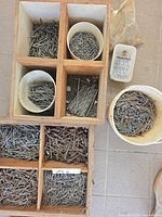 overview of organizer box, pail, Handy Pack container and bag of fasteners