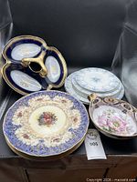 All fourteen pieces grouped, showing patterns and sizes