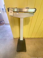 Front view of Sears physician scale showing full height and platform
